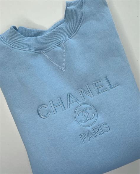 light blue chanel sweatshirt|Chanel flannel cardigan.